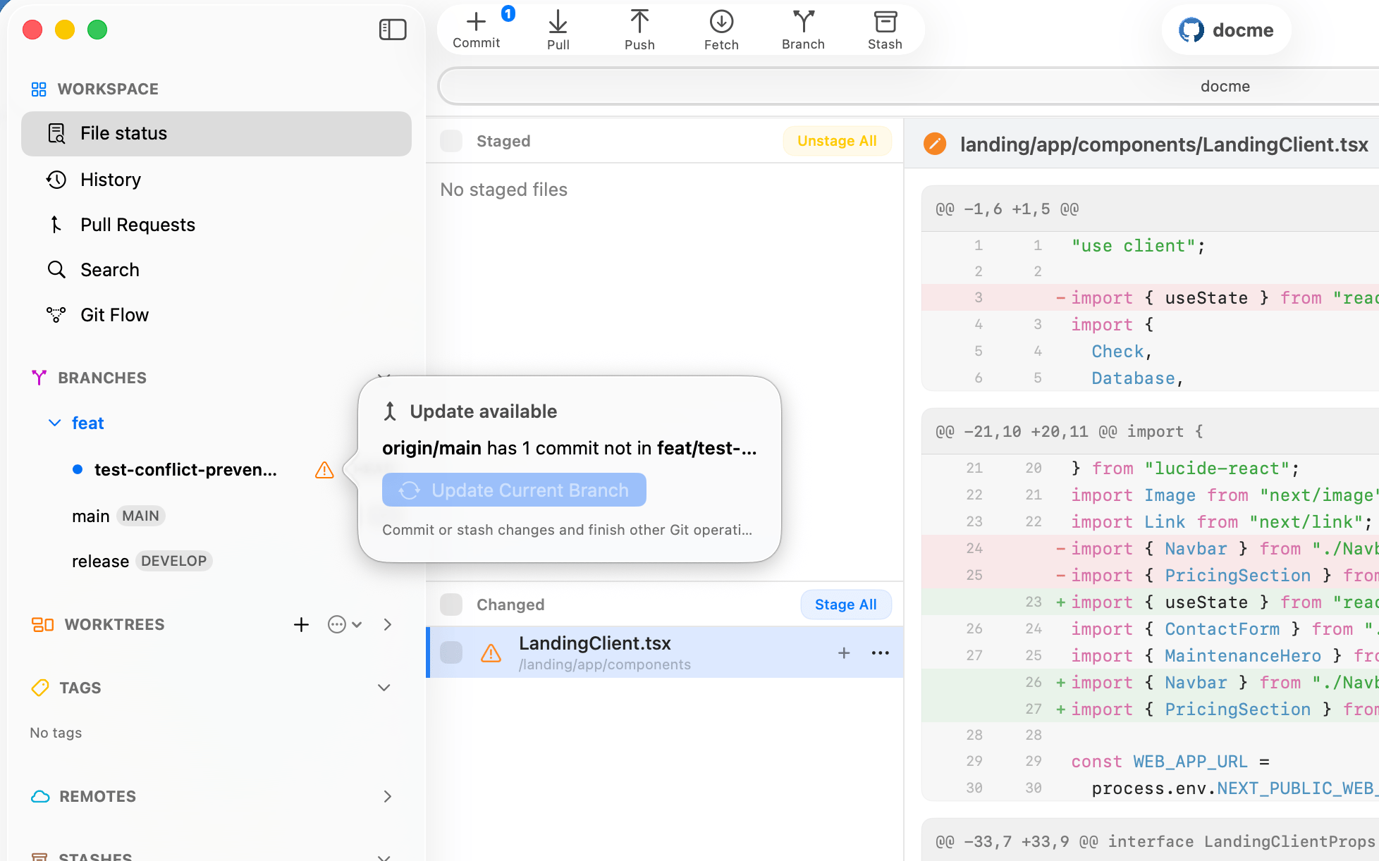 An update popover in Commit+ showing that origin main has a new commit and local changes must be committed or stashed first