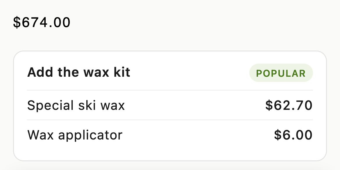 Product page detail: a card titled Add the wax kit lists Special ski wax at $62.70, written by the script, and Wax applicator at $6.00.