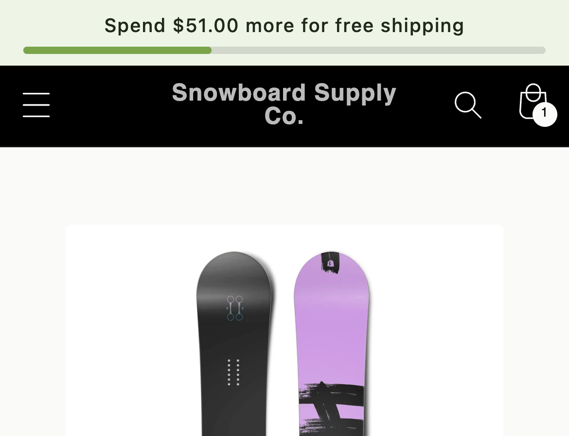 A pale green bar above a mobile storefront header reading Spend $51.00 more for free shipping, with a progress track about a third full.