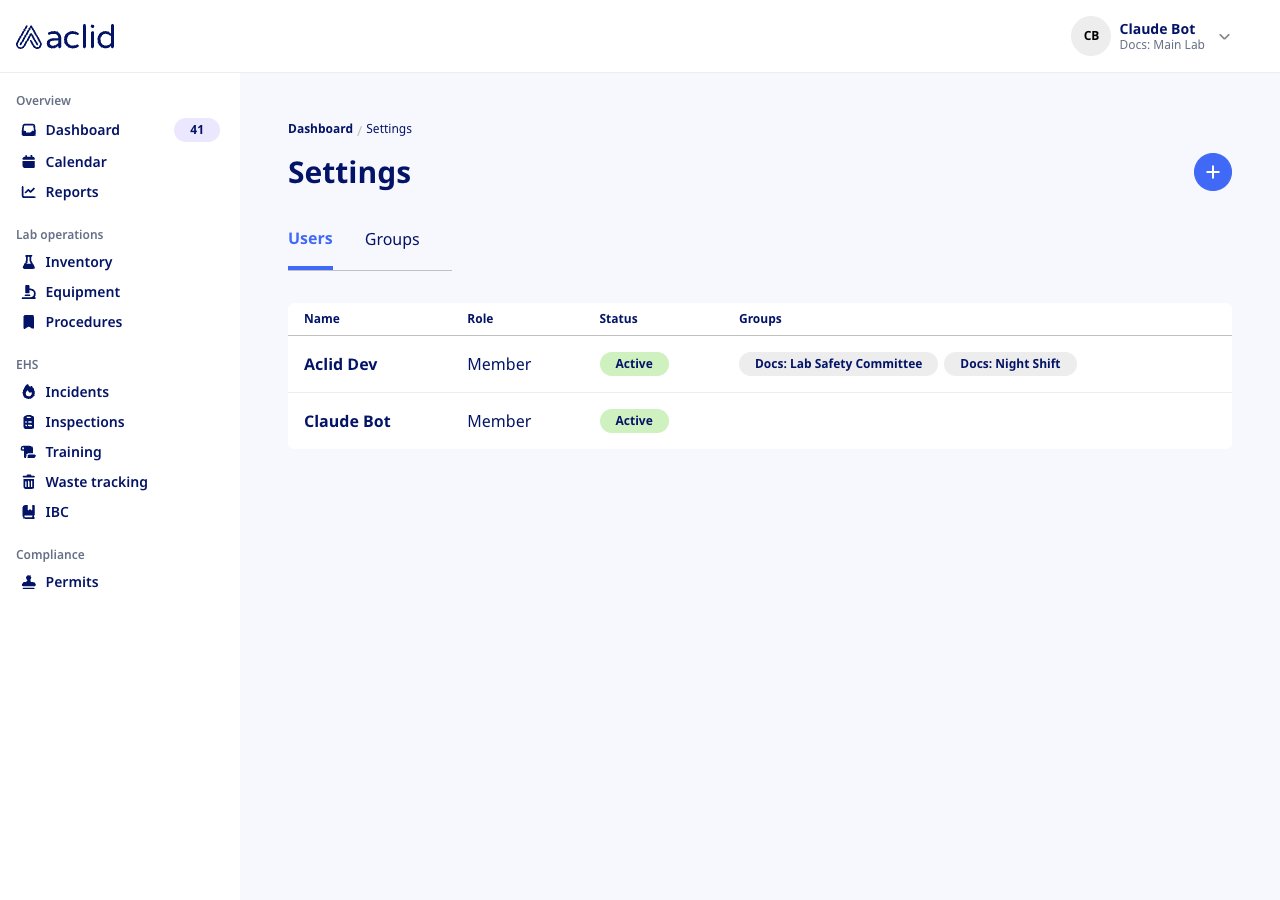 Settings page on the Users tab, listing two users with role, status and groups