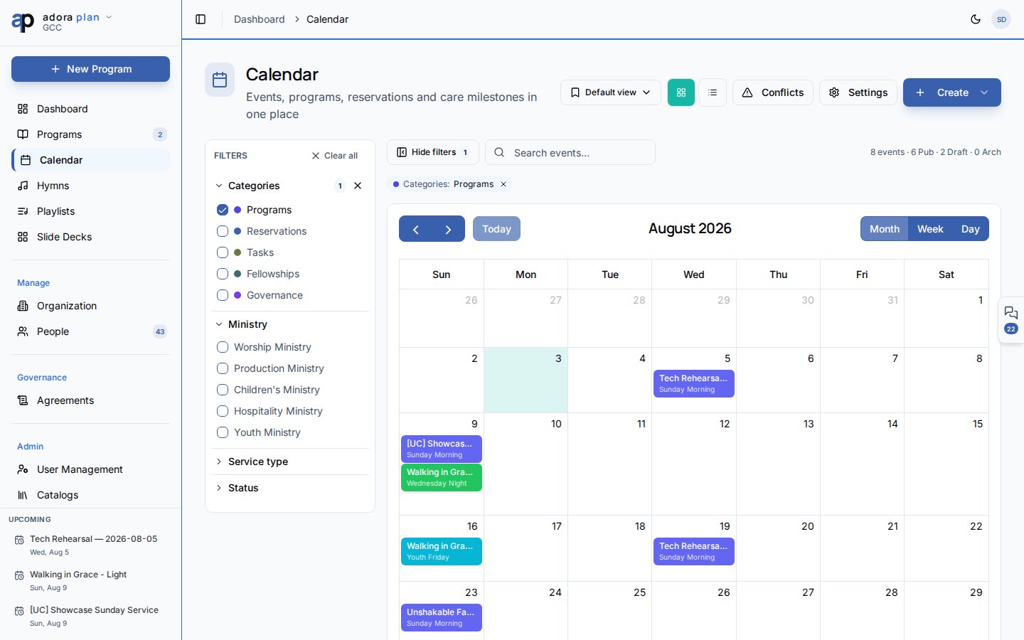 Visualização mensal do Calendar com blocos coloridos de programs e reservas