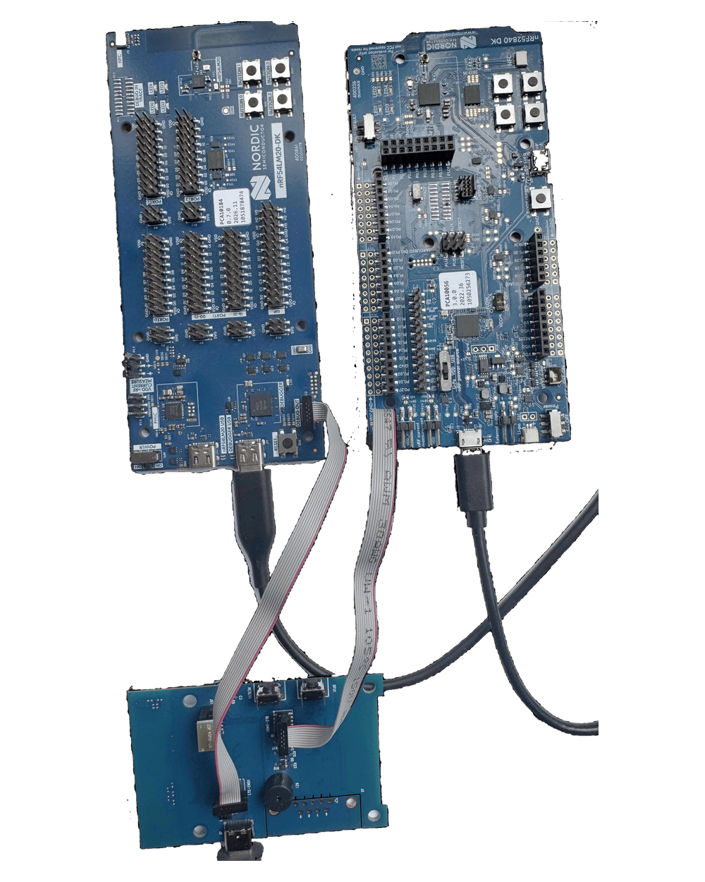 The same setup from the other side of the BLG20x board, showing where the two ribbon cables plug into its debug headers