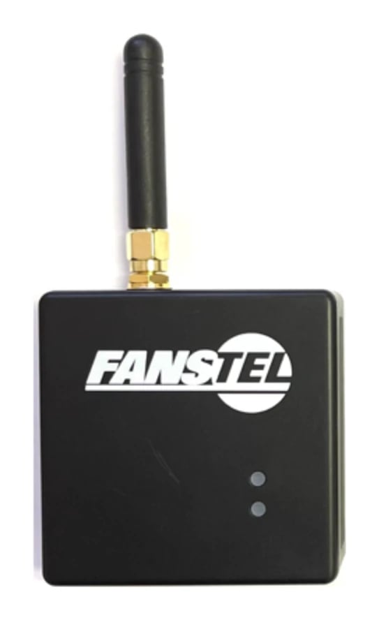 A Fanstel BWG840X gateway in its black enclosure with the external antenna fitted and two status LEDs on the front
