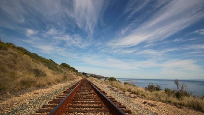 Railway tracks receding to the horizon.
