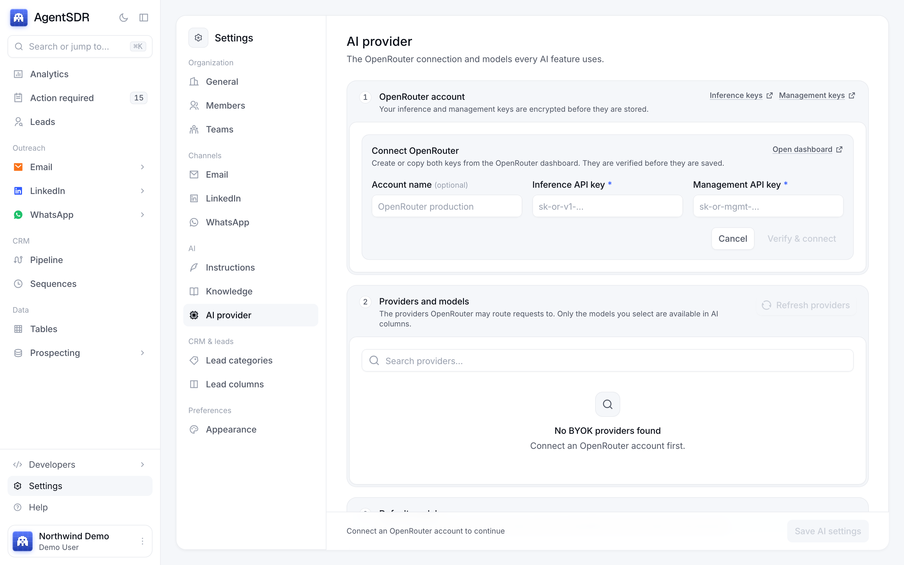 The Connect OpenRouter form on the AI provider page with account name, inference API key and management API key fields and a Verify and connect button