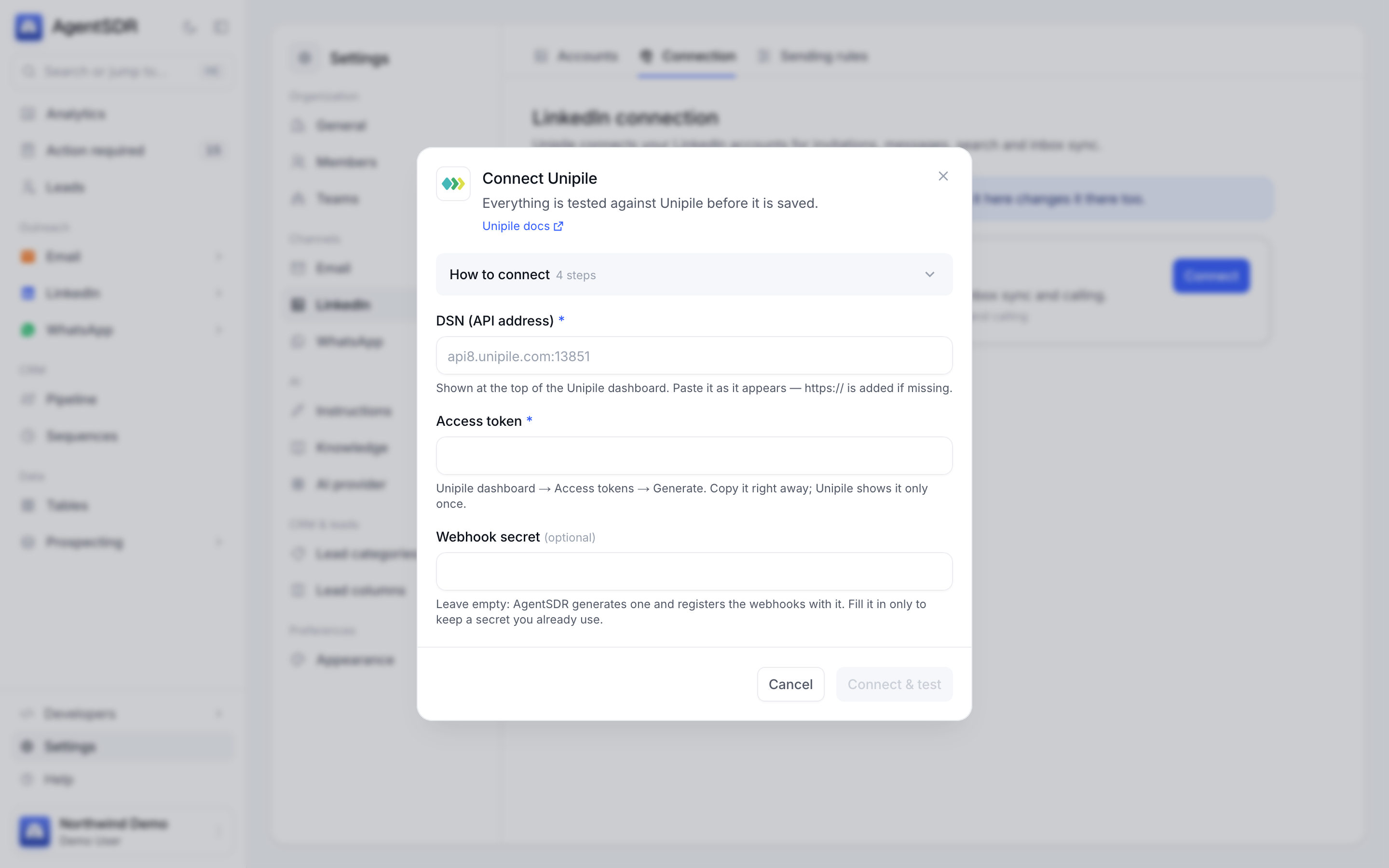 The Connect Unipile dialog with fields for the DSN, access token and an optional webhook secret