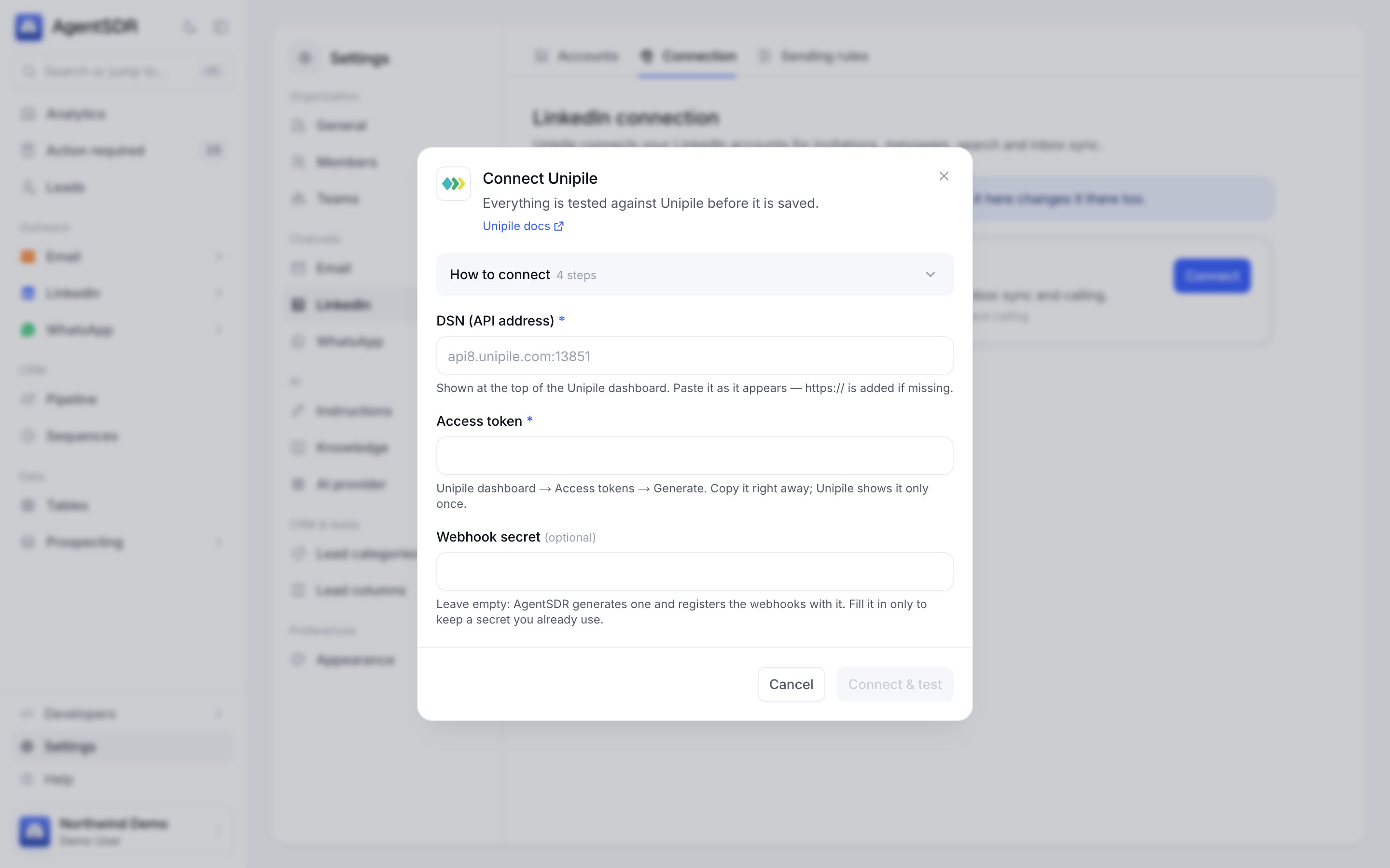 The Connect Unipile dialog with fields for the DSN, access token and an optional webhook secret