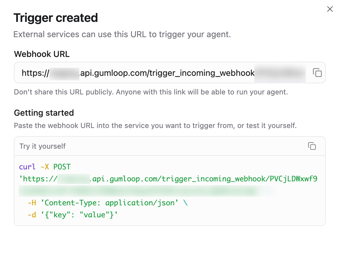 Trigger created screen showing the webhook URL and a Try it yourself curl example