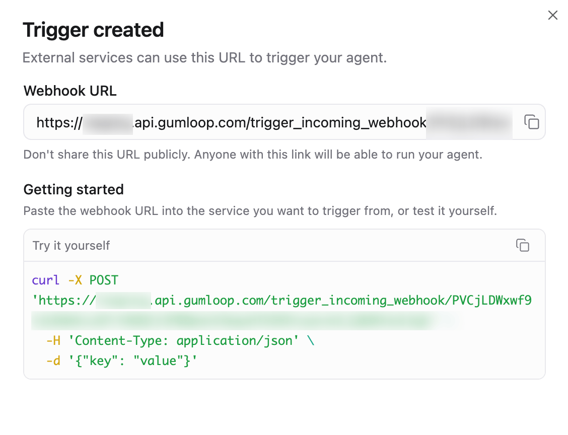 Trigger created screen showing the webhook URL and a Try it yourself curl example