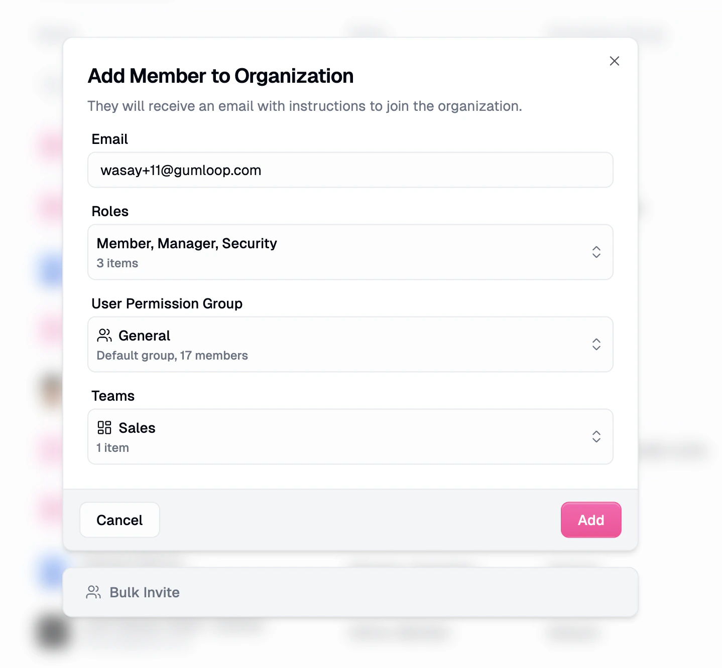 Add Member to Organization modal with fields for email, a multi-select Roles picker showing Member, Manager, Security selected, a User Permission Group selector, and a Teams selector.