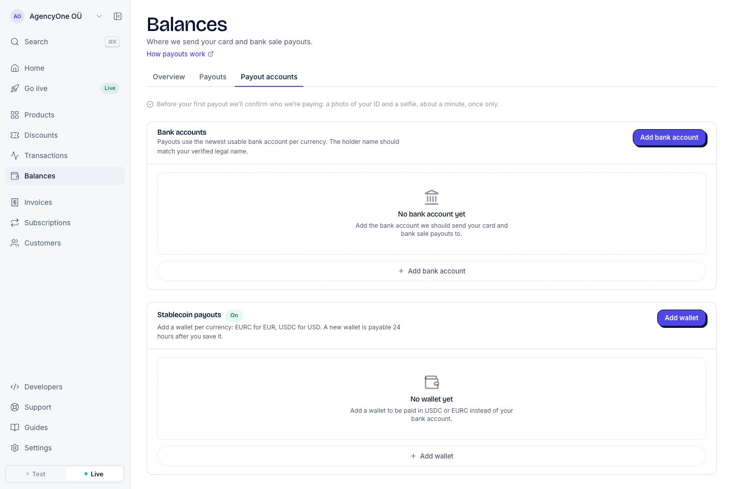 The Payout accounts tab with the Bank accounts section and, below it, the Stablecoin payouts section marked On, with an Add wallet button and the empty state No wallet yet