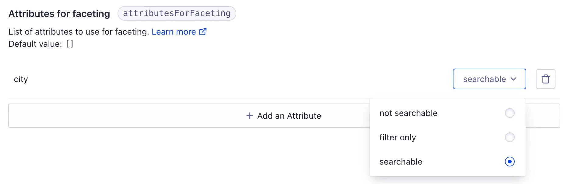 Screenshot of a drop-down menu showing 'searchable' selected for the 'city' attribute under 'Attributes for faceting'.