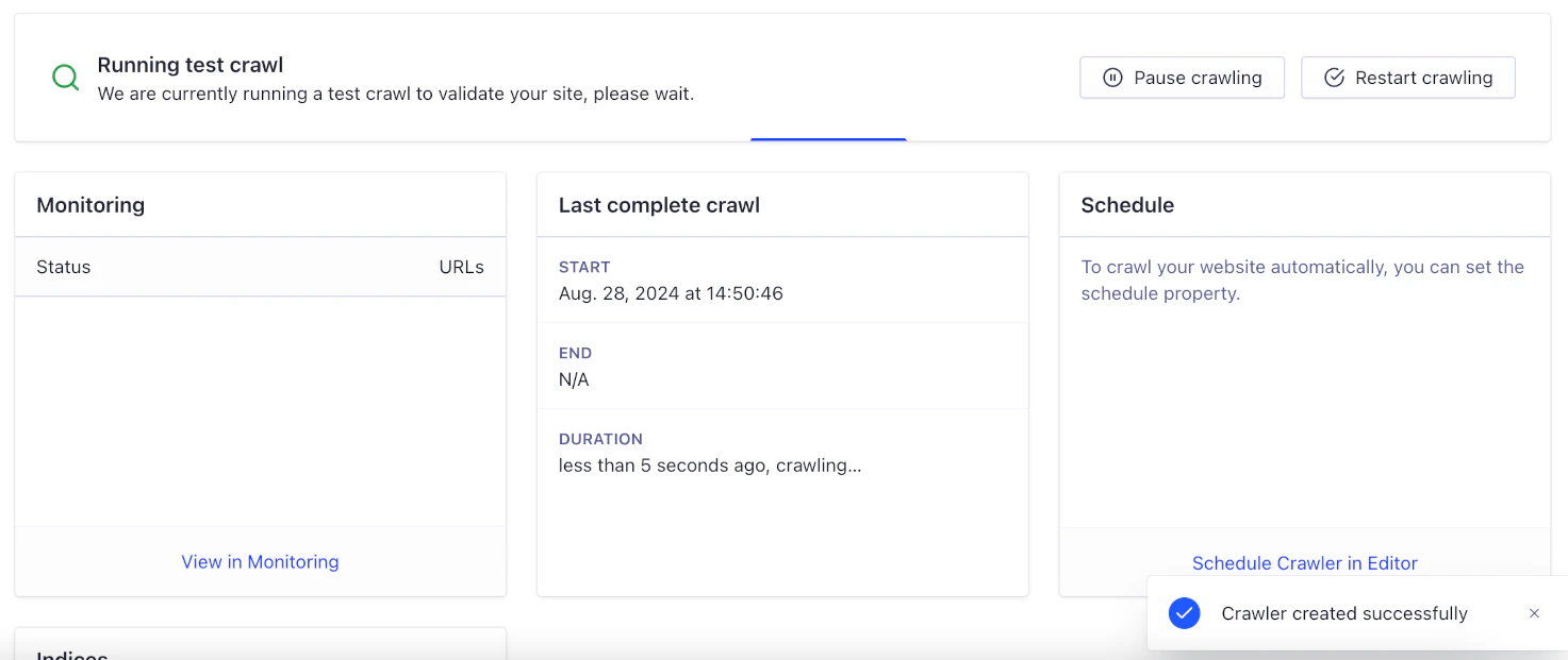 Screenshot of a test crawl in progress with 'Pause crawling' and 'Restart crawling' buttons, monitoring status, and a success notification.