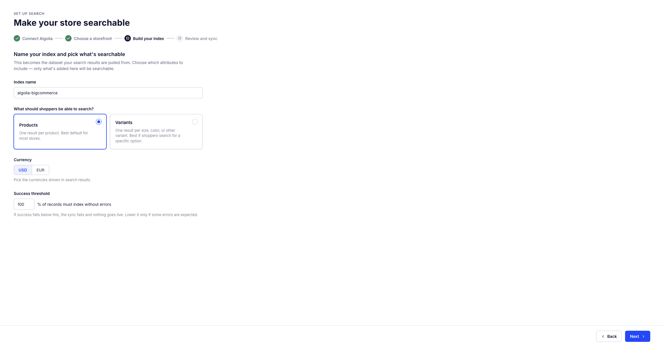 Screenshot of the 'Build your index' step with an index name, 'Products' selected, a currency picker, and a success threshold of 100.