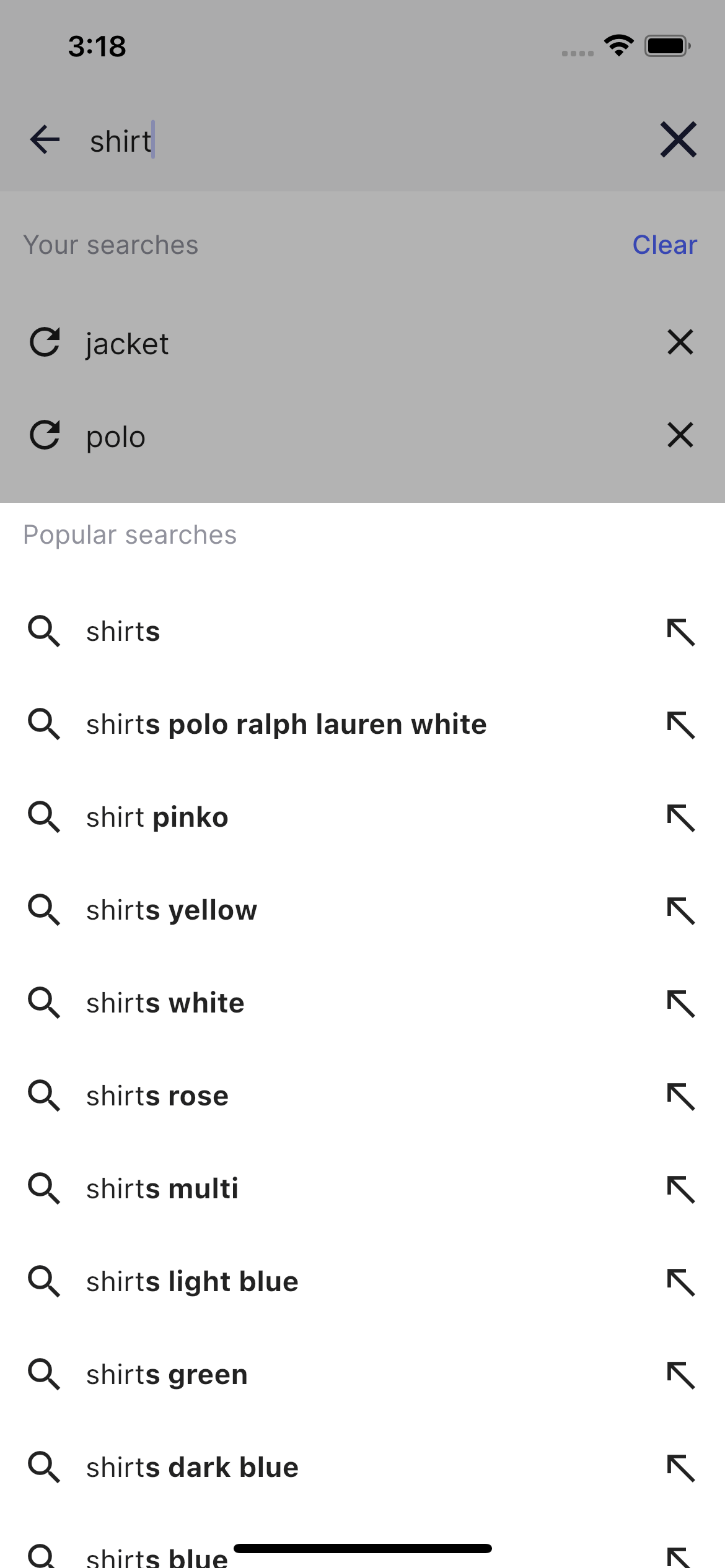 Screenshot of a search interface with 'shirt' in the search box, showing 'Your searches' for 'jacket' and 'polo,' and a 'Popular searches' list.