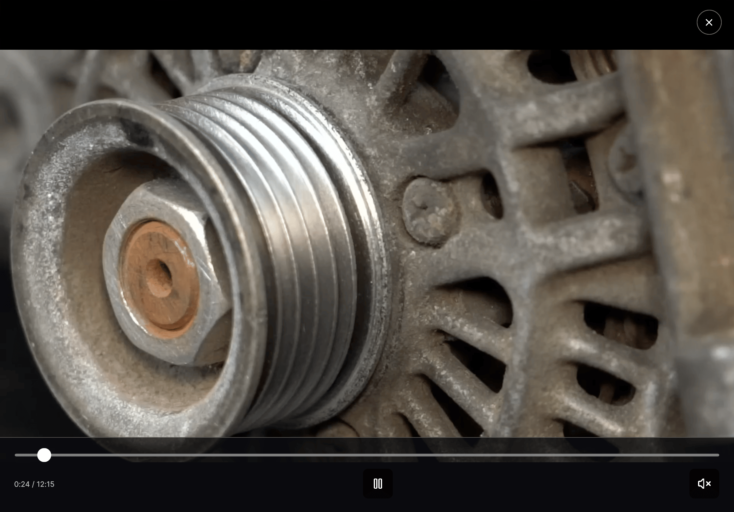 Expanded video with playback, seek, audio, and close controls