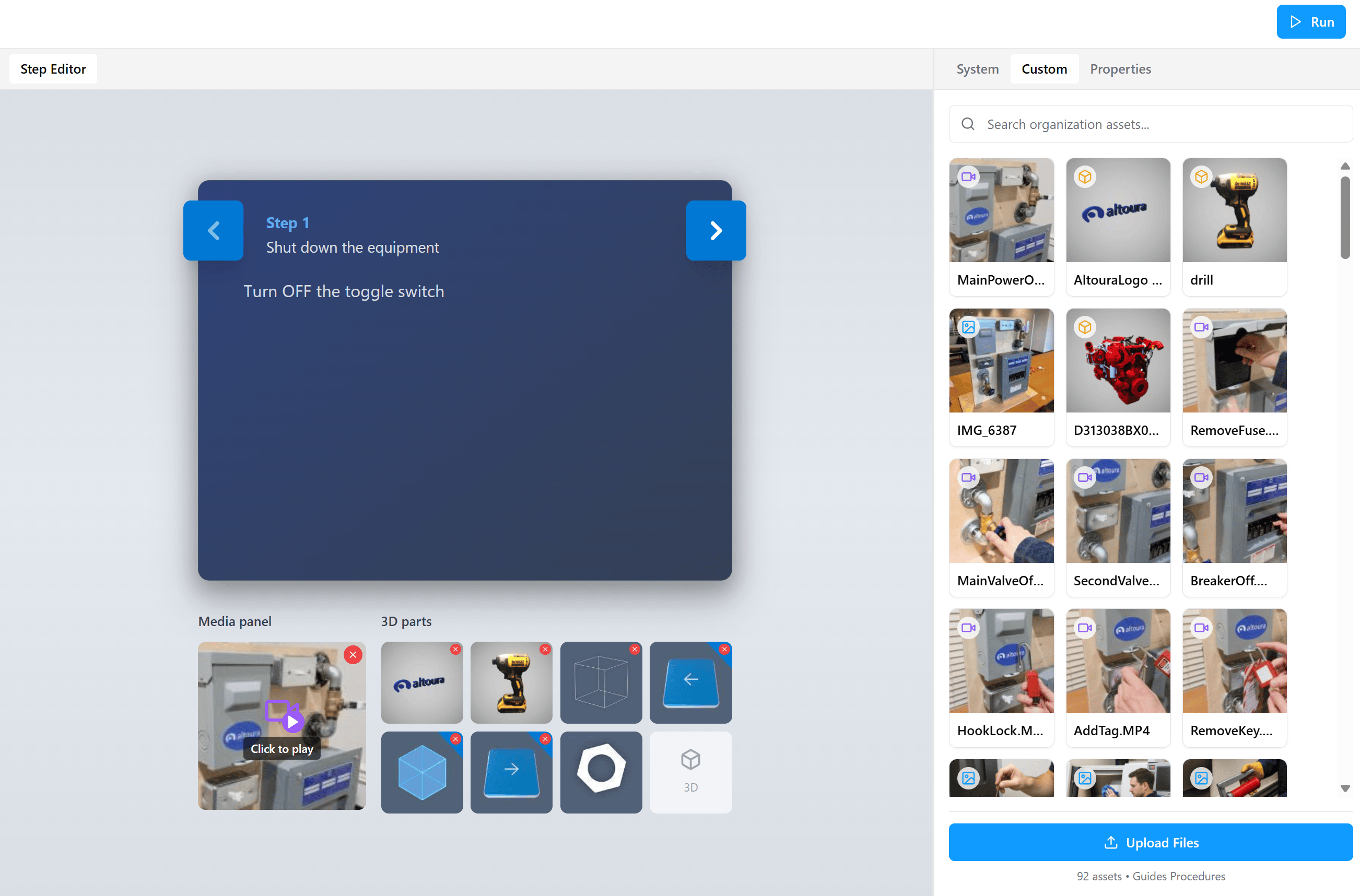 The Custom tab showing a grid of organization-uploaded assets including videos, images, and 3D models with their type-indicator badges, and an Upload Files button at the bottom.