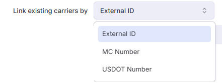 Shows the Link existing carriers by dropdown menu open, presenting identifier options like External ID, MC Number, and USDOT Number.