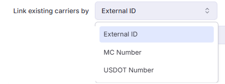 Shows the Link existing carriers by dropdown menu open, presenting identifier options like External ID, MC Number, and USDOT Number.