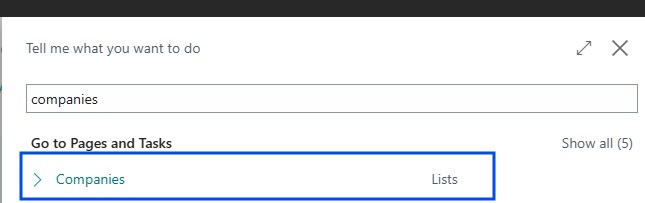 Shows Business Central application menu search bar with a blue box highlighting the Companies task list option.