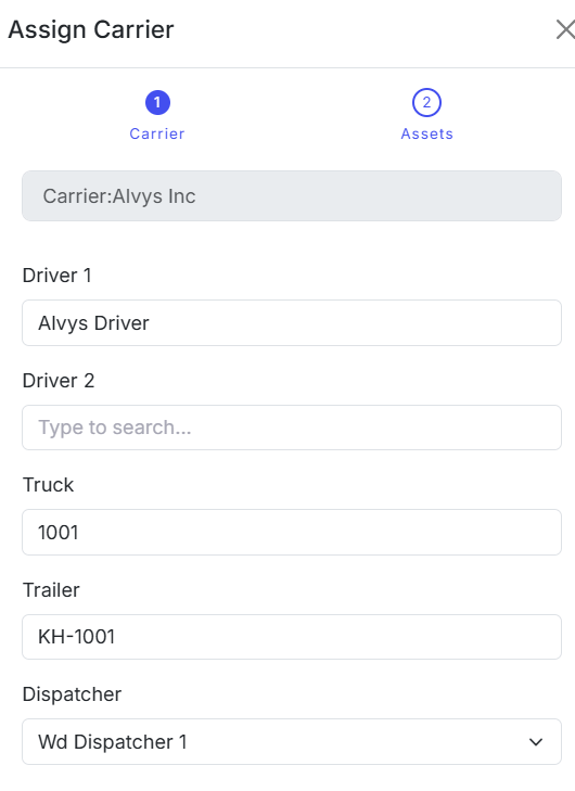 The asset assignment fields showing the driver, truck, and trailer selection dropdowns populated.