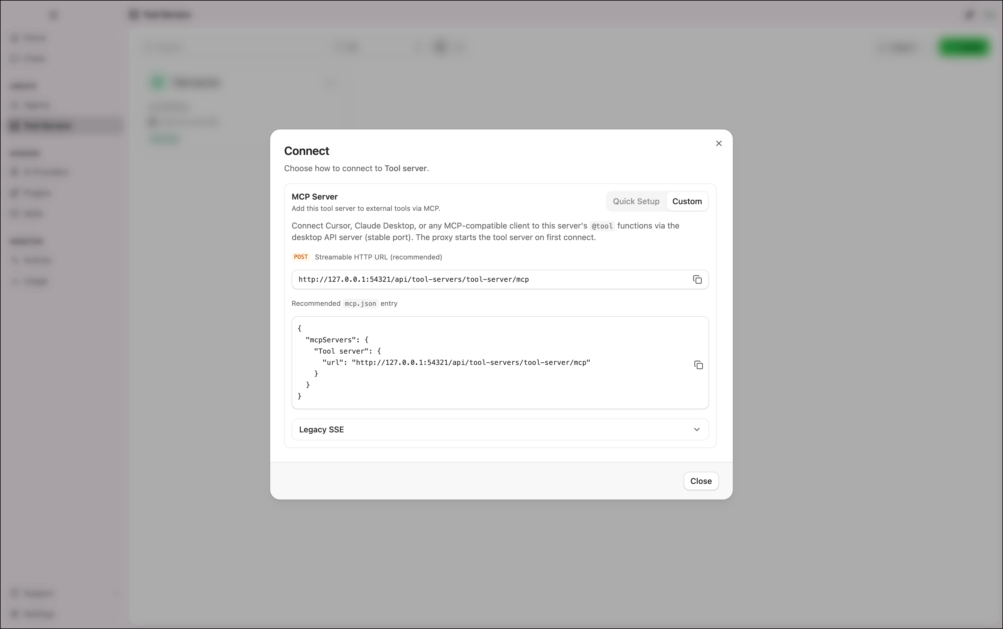 Connect dialog Custom tab showing the Streamable HTTP URL, recommended mcp.json entry, and Legacy SSE accordion
