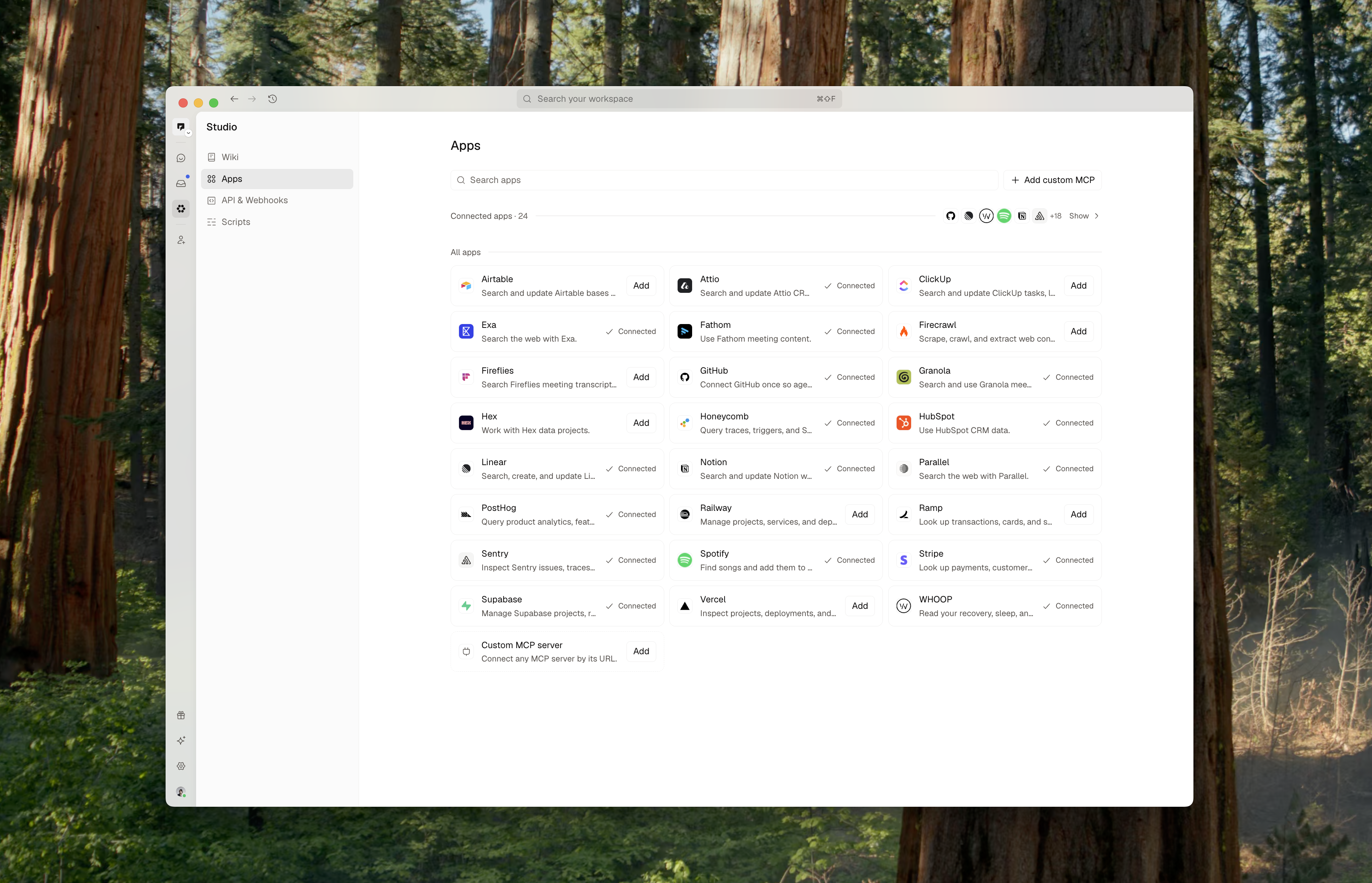 Studio Apps page showing app connection cards, search, and custom MCP controls.
