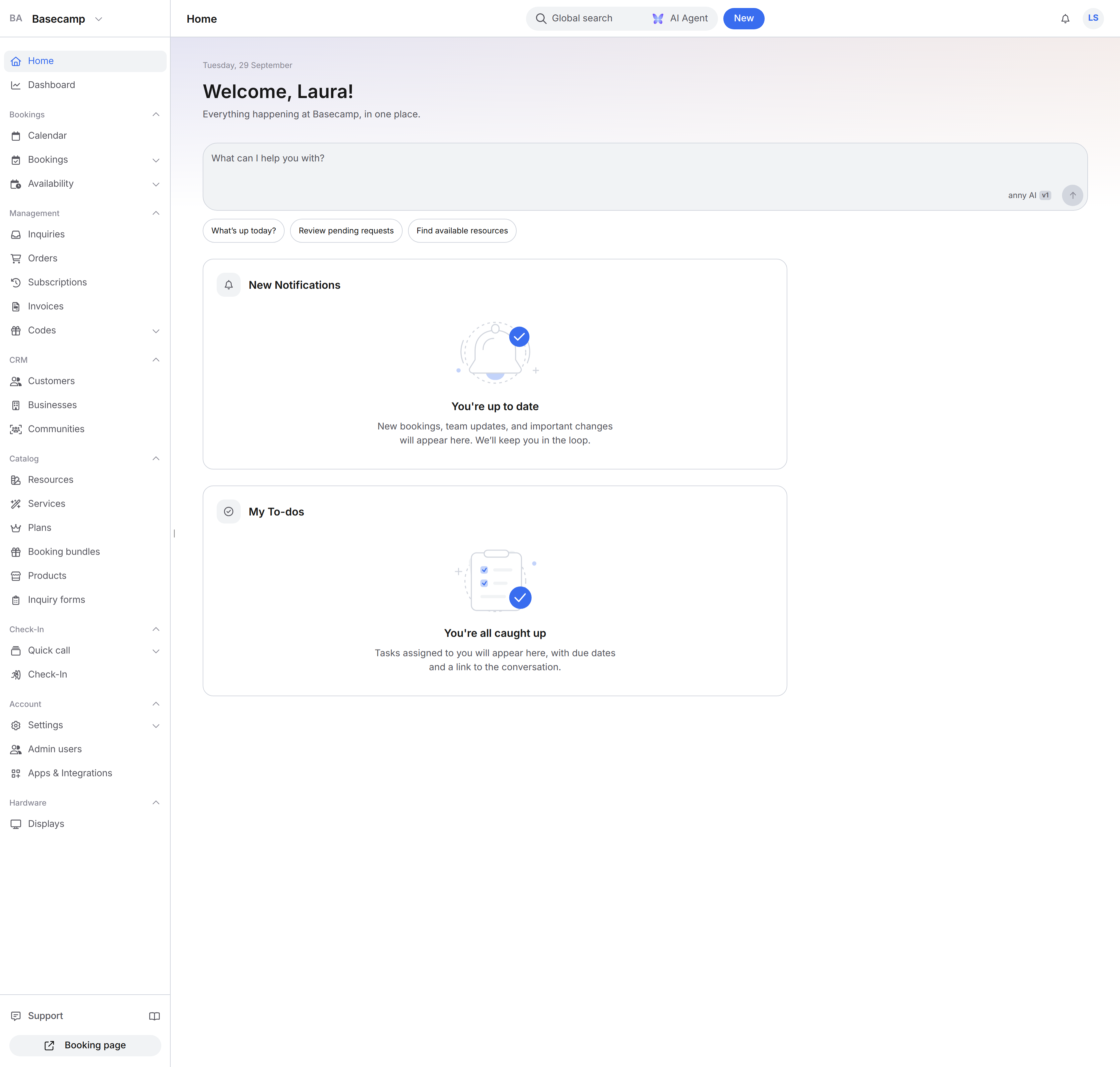 Admin home: sidebar from Home through Displays, Global search, AI Agent, and New in the top bar, the Welcome Laura heading, and the New Notifications and My To-dos cards