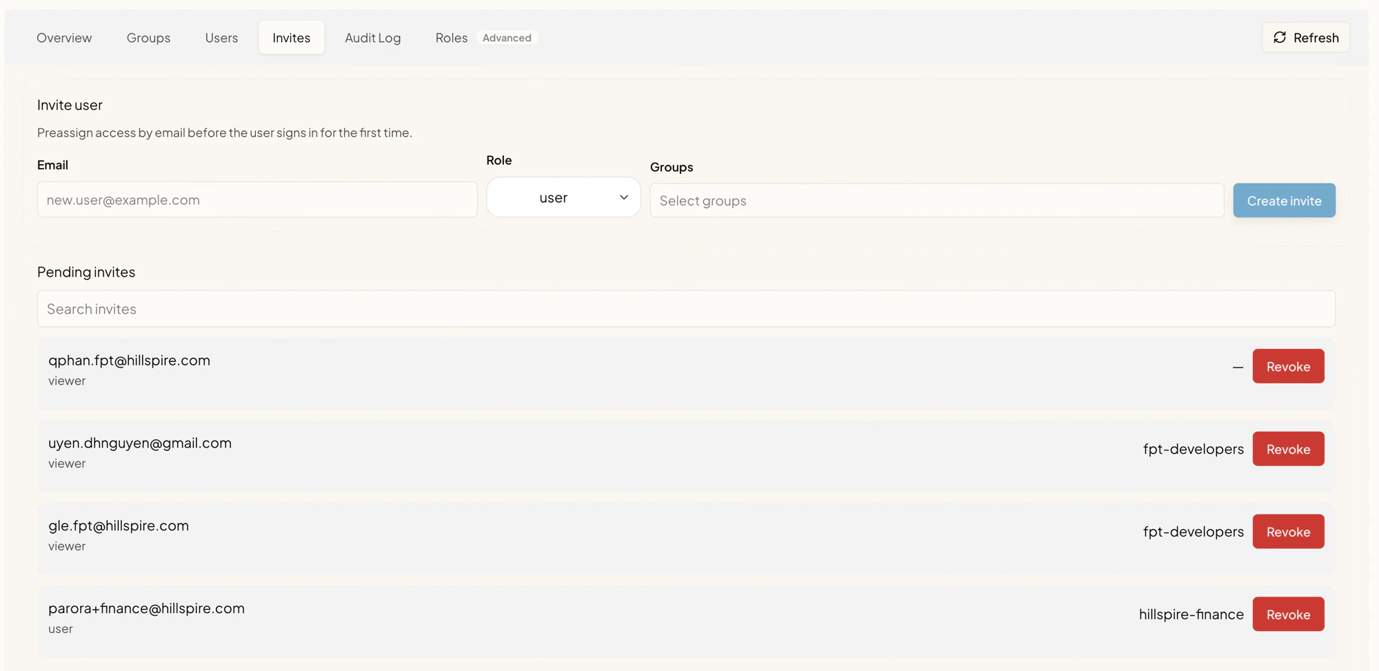 Invites sub-tab with an Invite user form (Email, Role, Groups, Create invite) and a Pending invites list showing four invited emails with their assigned role or group and a Revoke button each.