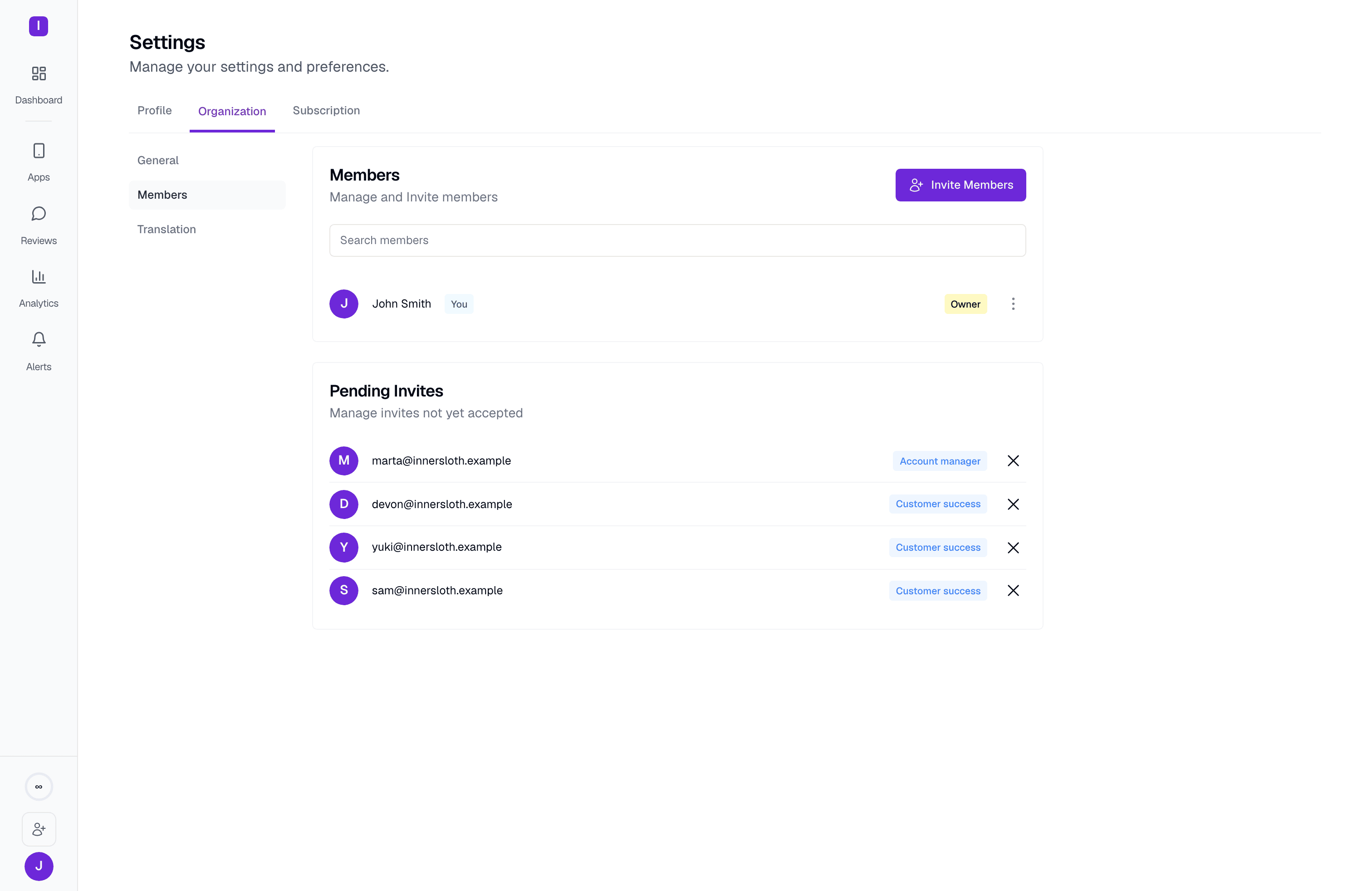 Settings > Organization > Members: the current member list and four pending invites, each with an assigned role