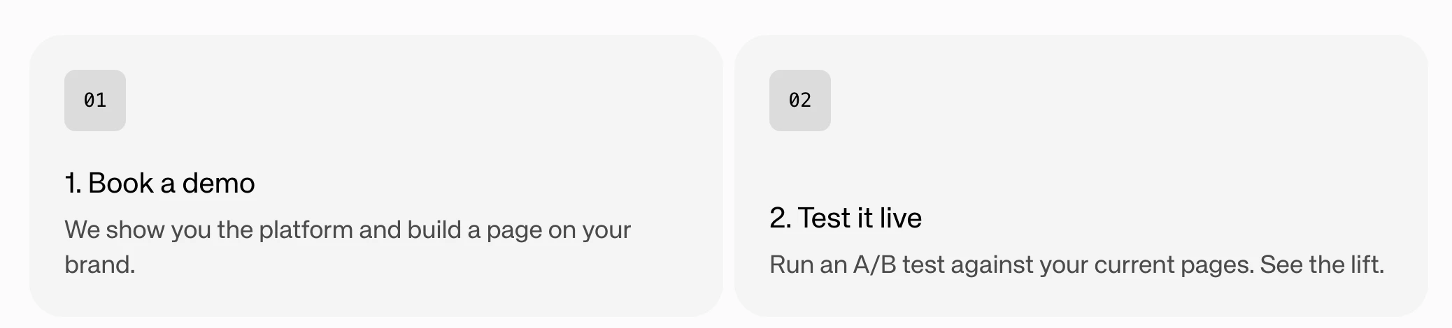 FeatureCards slice showing two numbered cards with headlines and descriptions