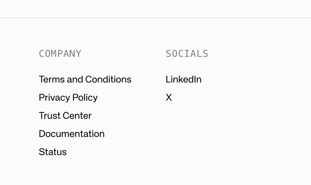 Footer links showing Company and Socials columns with navigation links