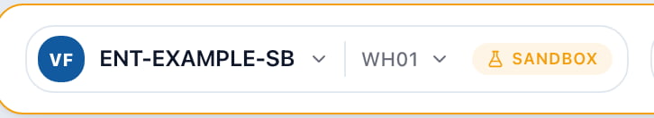Arcus workspace pill showing entity code ENT-EXAMPLE-SB, a divider, location code WH01, and an amber SANDBOX chip