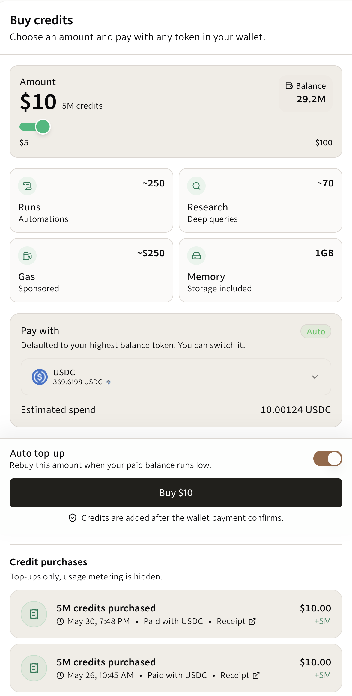 Buy credits screen showing the amount, payment token, estimated spend, Auto top-up switch, Buy button, and purchase history.