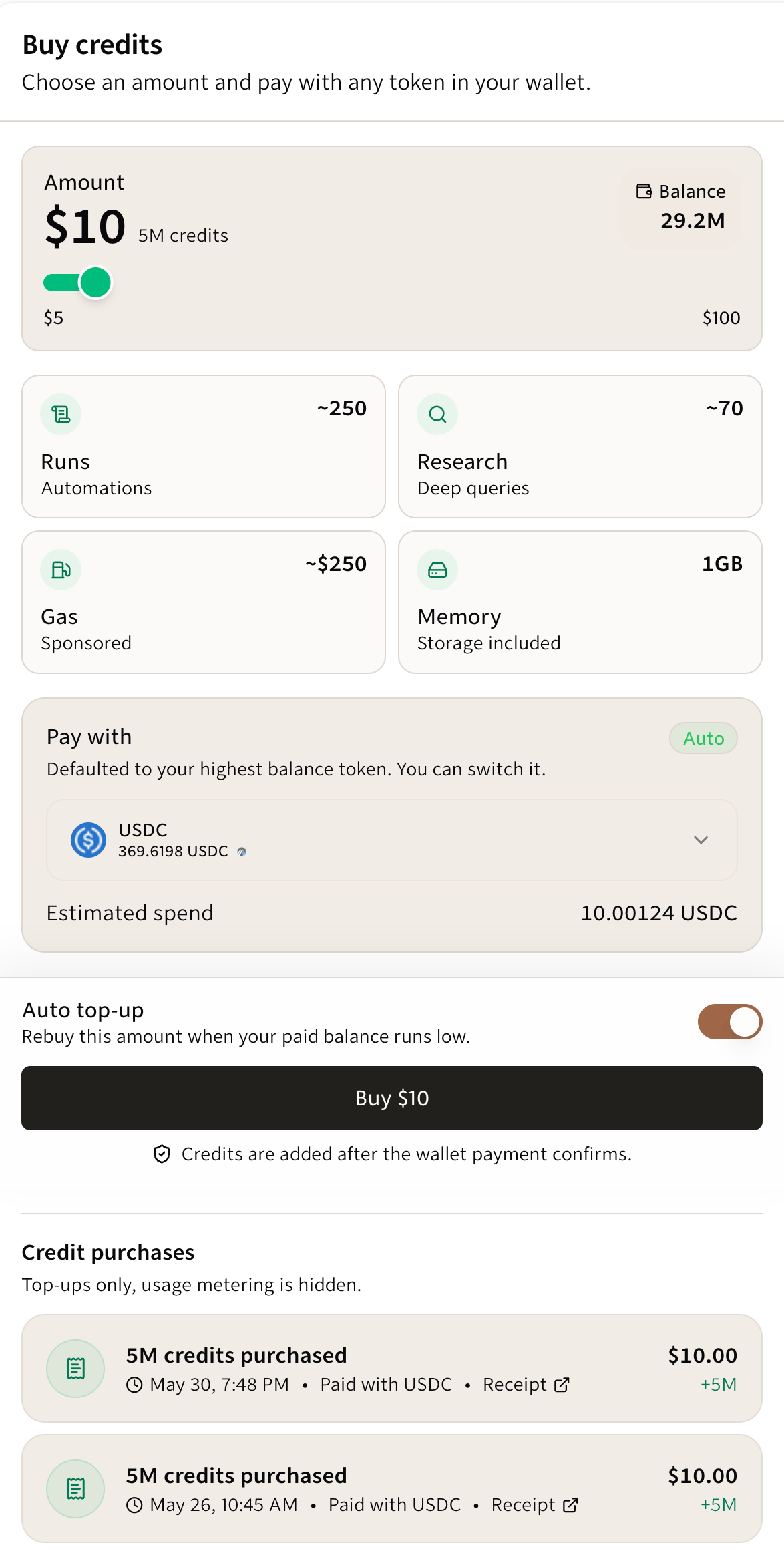 Buy credits screen showing the amount, payment token, estimated spend, Auto top-up switch, Buy button, and purchase history.