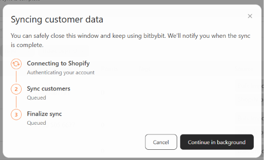Syncing customer data modal showing the connecting, syncing, and finalizing stages, with a Continue in background button