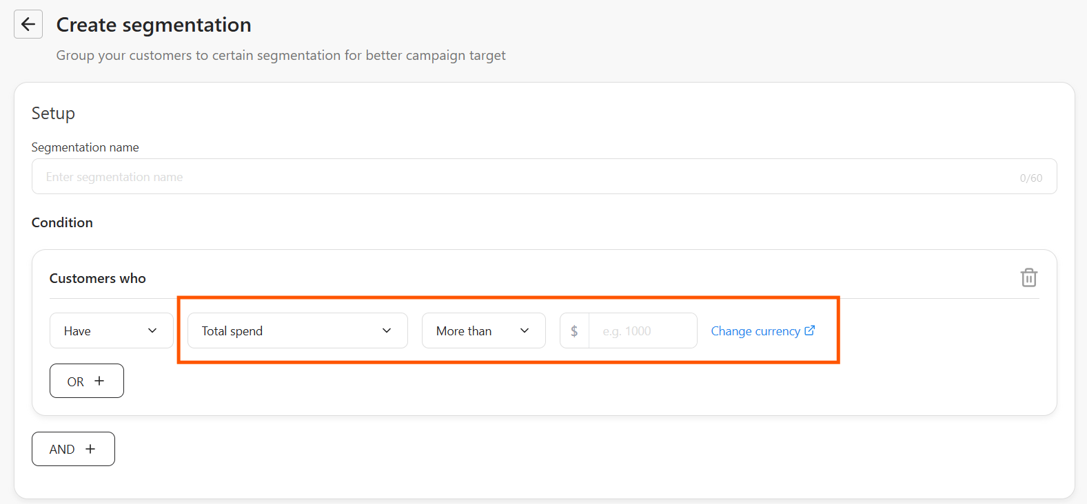 Total spend condition with a comparator set, the currency symbol prefix on the amount field, and the Change currency link