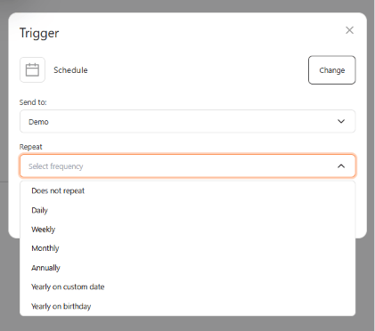 Schedule trigger panel with the Repeat dropdown open on the Select frequency placeholder, listing Does not repeat, Daily, Weekly, Monthly, Annually, Yearly on custom date, and Yearly on birthday.