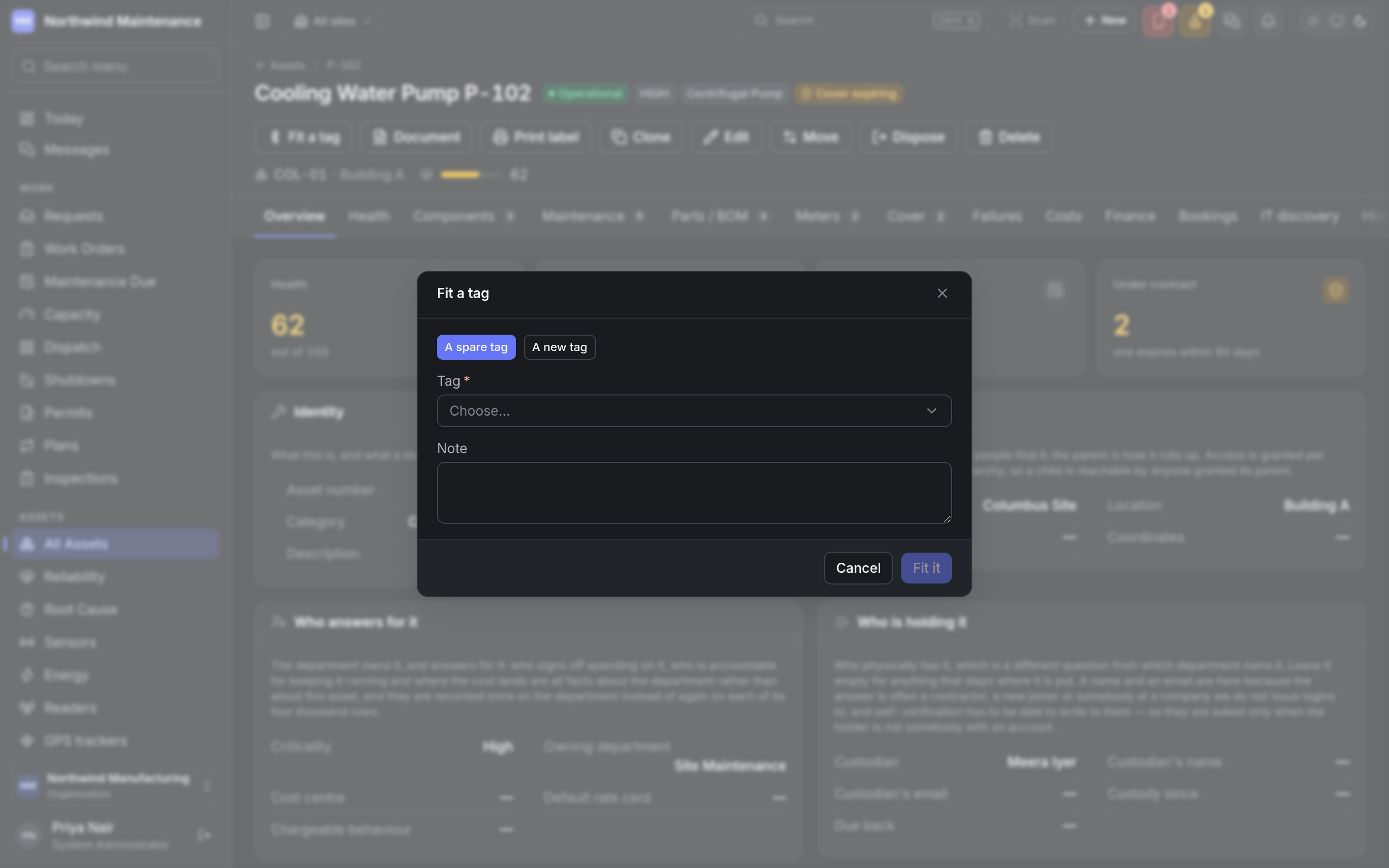 The Fit a tag dialog opened from an asset, offering a spare tag or a new one