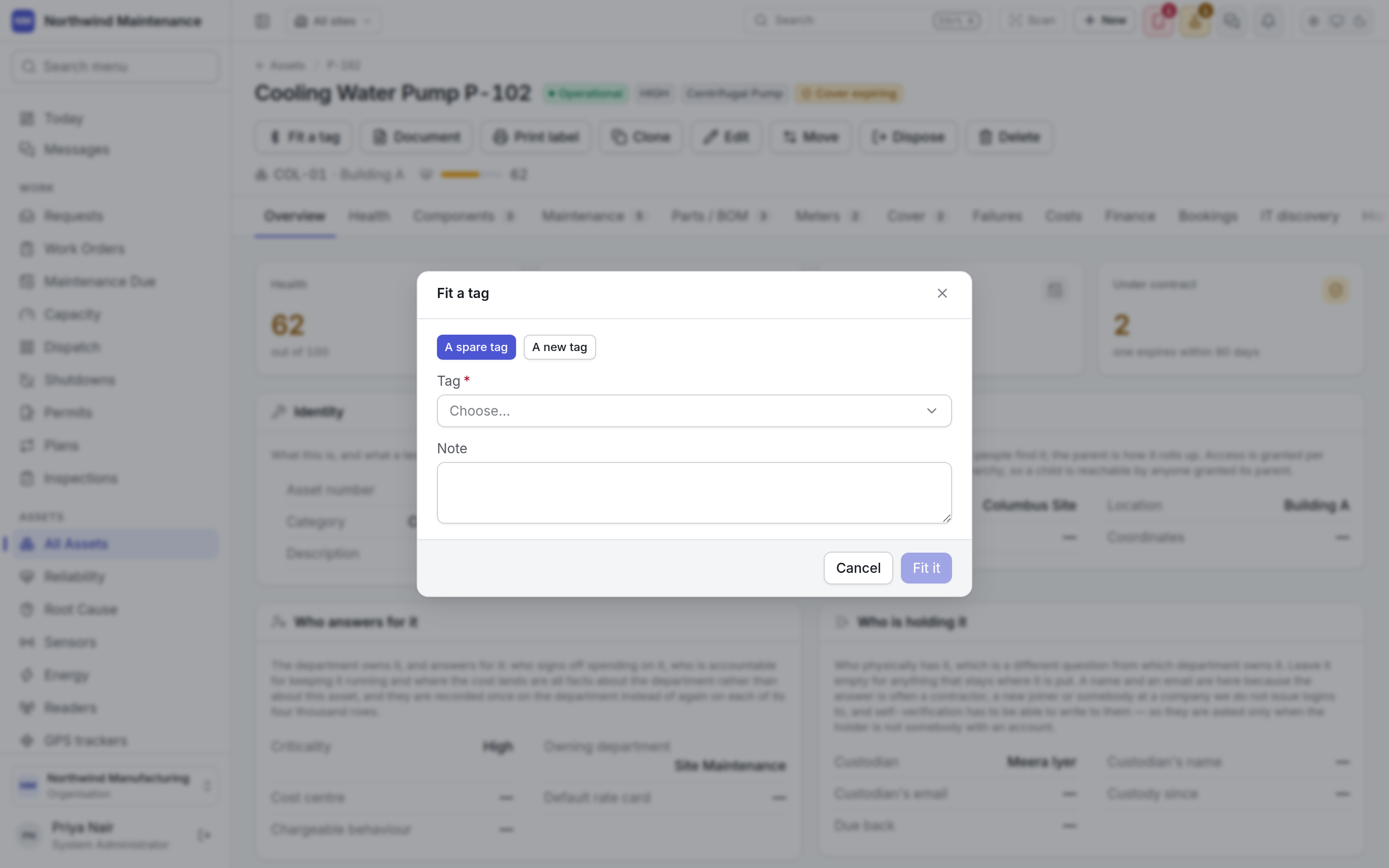 The Fit a tag dialog opened from an asset, offering a spare tag or a new one