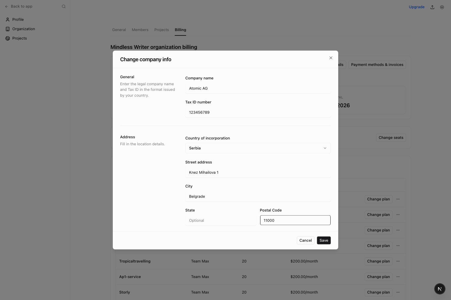 Company billing details dialog with legal company name, Tax ID, country, and registered billing address