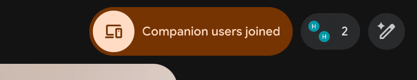 Google Meet showing a "Companion users joined" banner and a participant count of 2