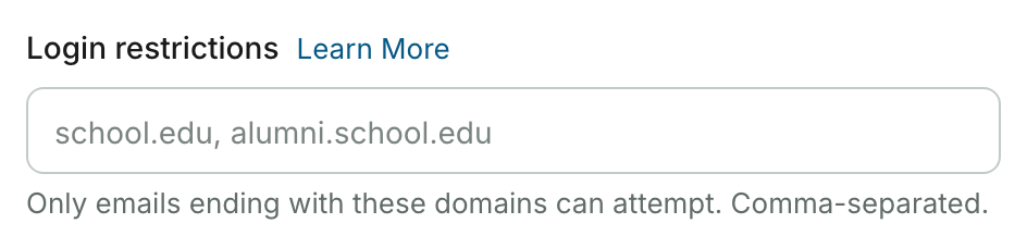Campo Login restrictions con un enlace Learn More, el texto de ejemplo school.edu, alumni.school.edu y el texto de ayuda Only emails ending with these domains can attempt. Comma-separated