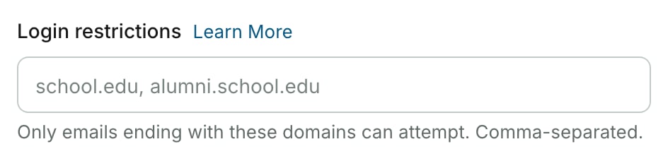 Campo Login restrictions con un enlace Learn More, el texto de ejemplo school.edu, alumni.school.edu y el texto de ayuda Only emails ending with these domains can attempt. Comma-separated