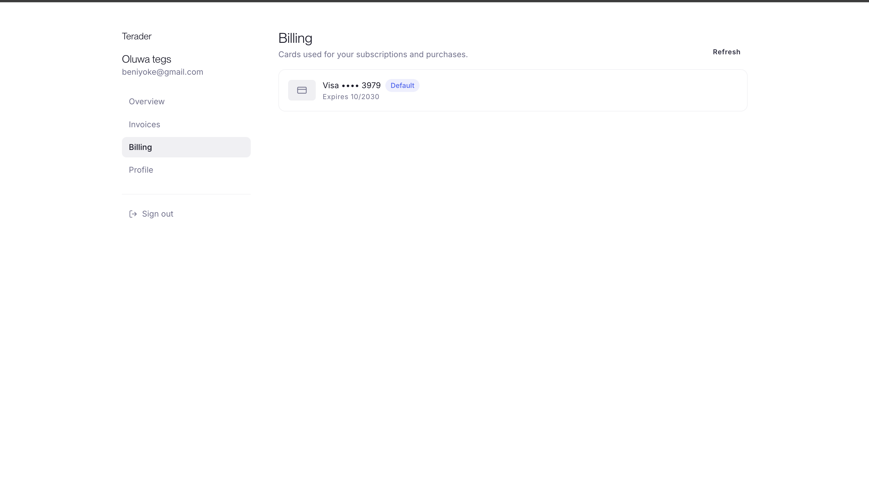 The customer portal Billing page listing a saved Visa card with its last four digits, a Default badge and its expiry date