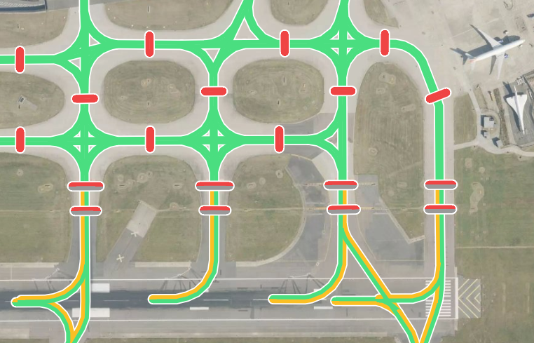 Division lighting data overlaid on a satellite map of London Heathrow Airport, showing taxiway lighting and stop bars