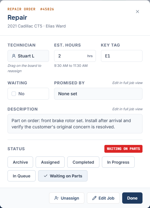 Job Details modal showing the repair order header, job fields, status buttons, and footer buttons