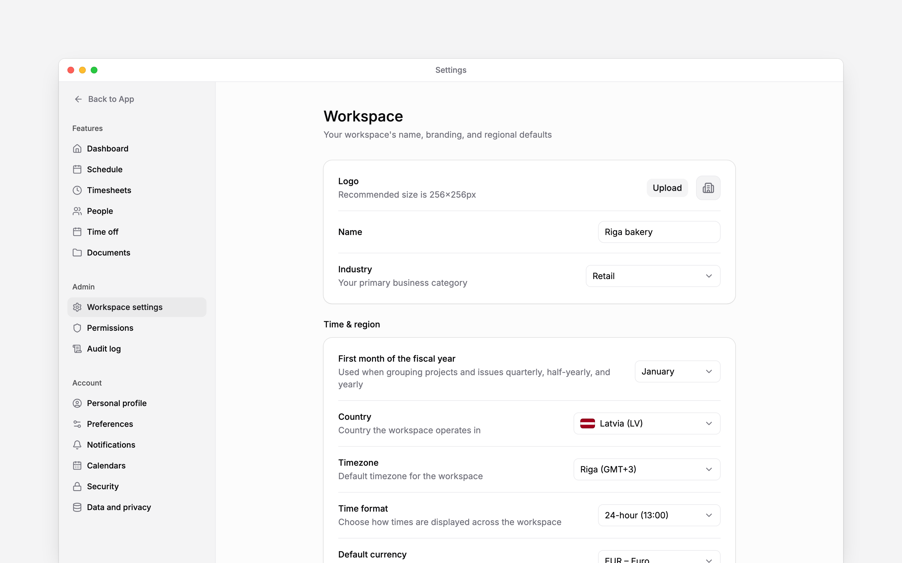 The real Workspace settings page showing logo, name, and industry controls
