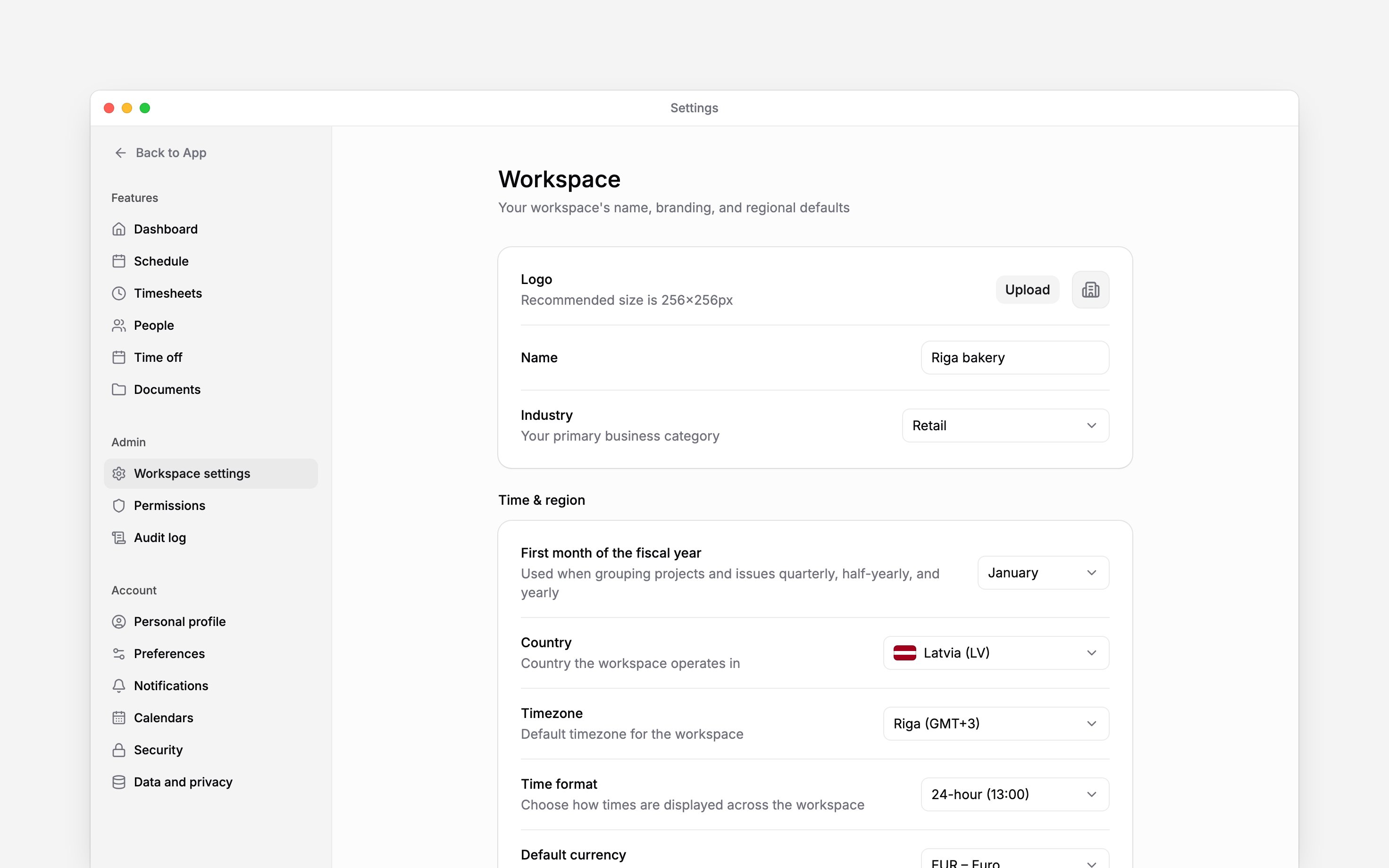 The real Workspace settings page showing logo, name, and industry controls