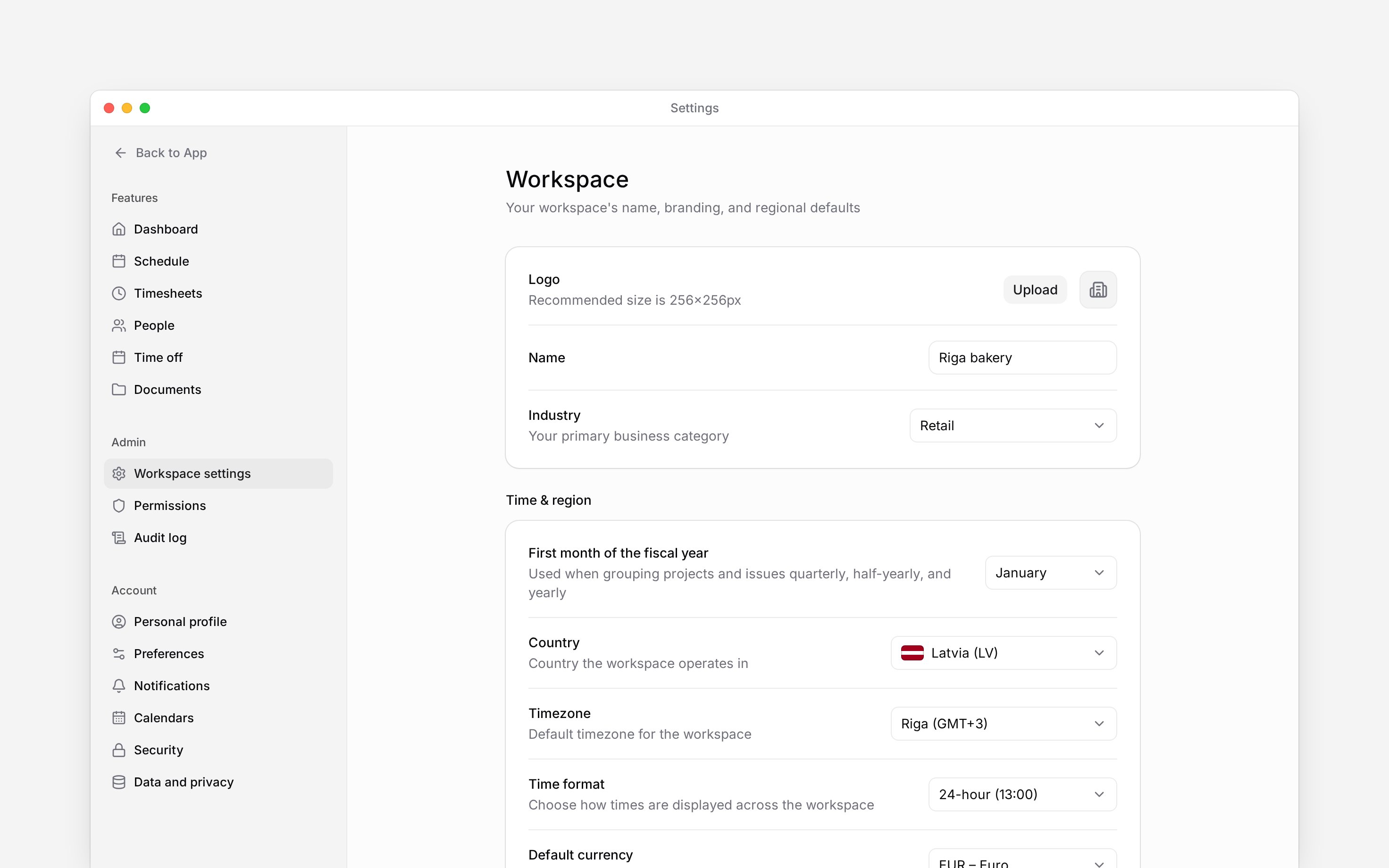 The real Workspace settings page showing logo, name, and industry controls